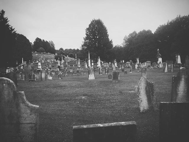 A black and white photo of a cemetary in Vermont, US.